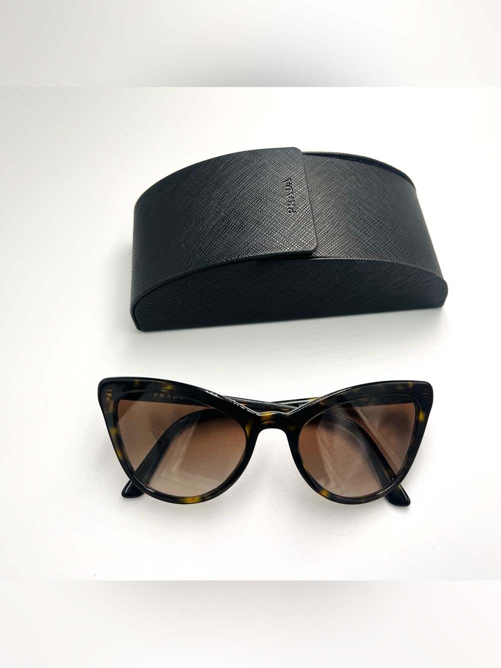 Prada Tortoiseshell Cat Eye Sunglasses